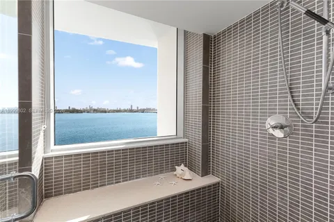 a view of a lake from a balcony