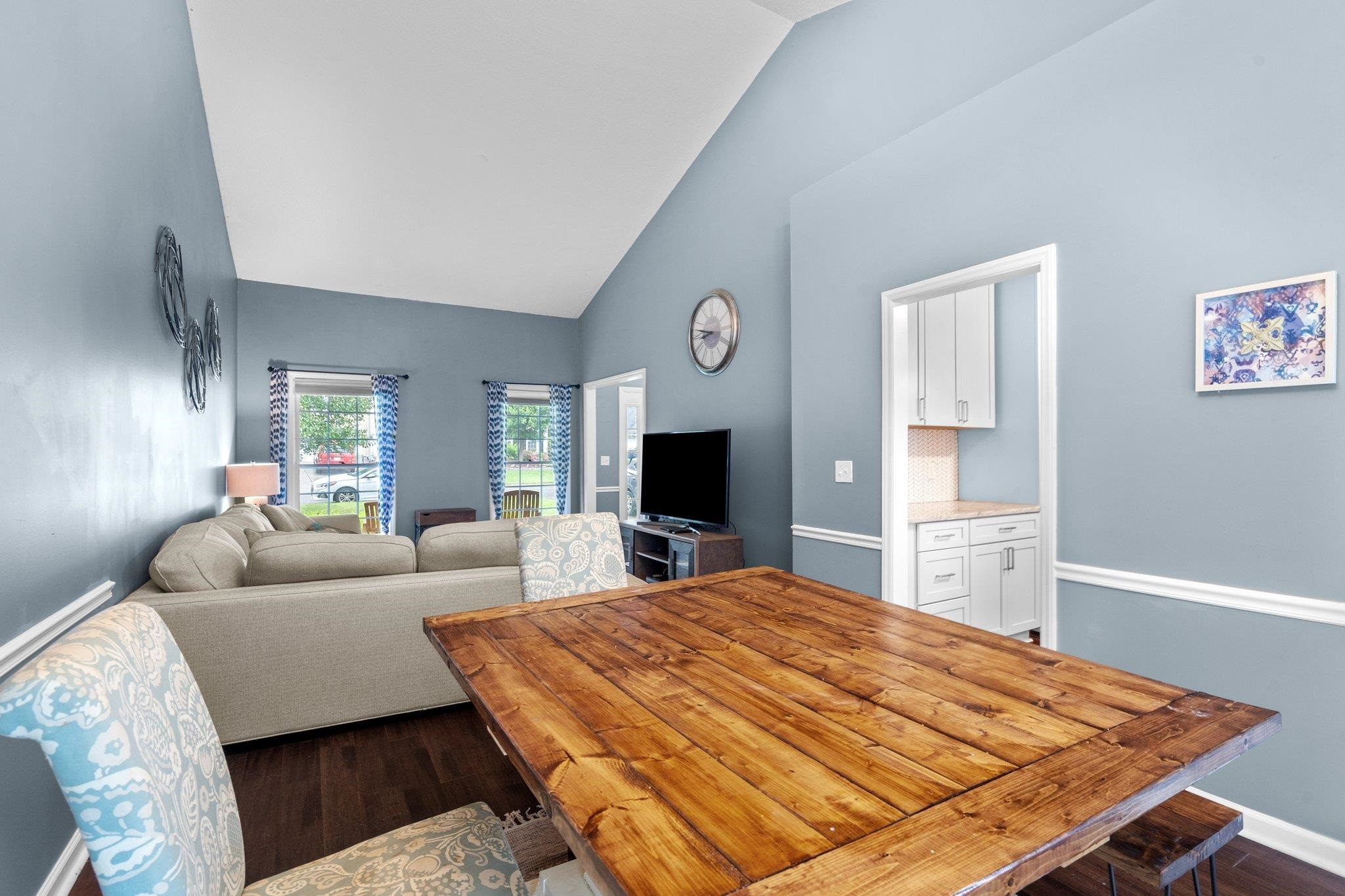 6305 Dry Fork Lane Raleigh, NC 27617 - Photo 12 of 41 a bed room with a bed and a television