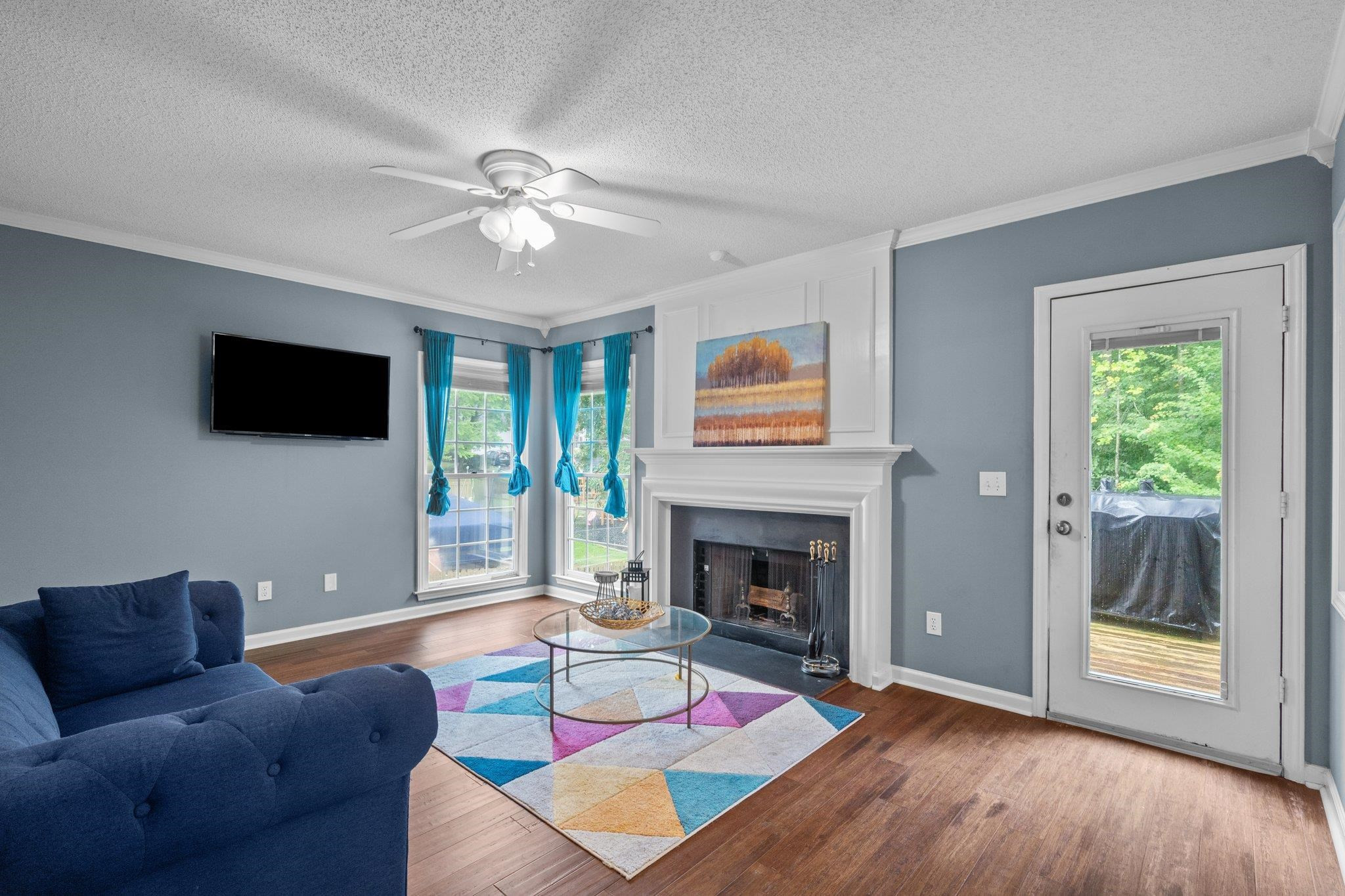 6305 Dry Fork Lane Raleigh, NC 27617 - Photo 13 of 41 a living room with furniture and a fireplace