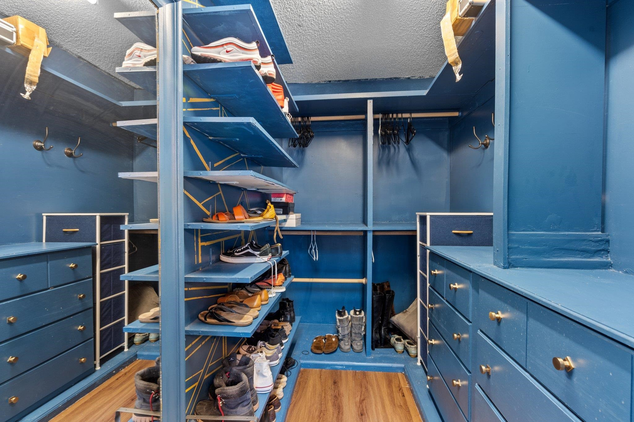 6305 Dry Fork Lane Raleigh, NC 27617 - Photo 25 of 41 a view of walk in closet with clothes and shoes