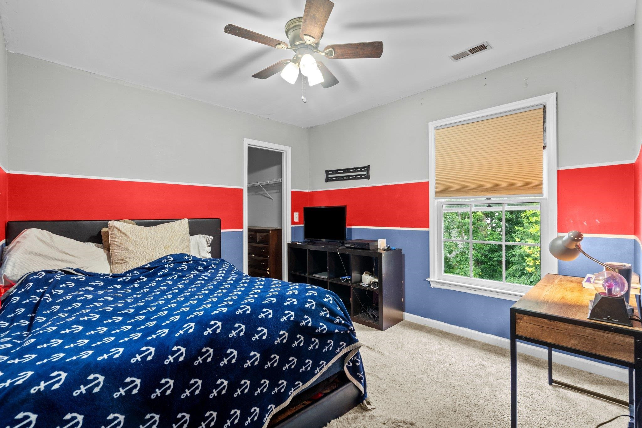 6305 Dry Fork Lane Raleigh, NC 27617 - Photo 27 of 41 a bedroom with a bed and a window