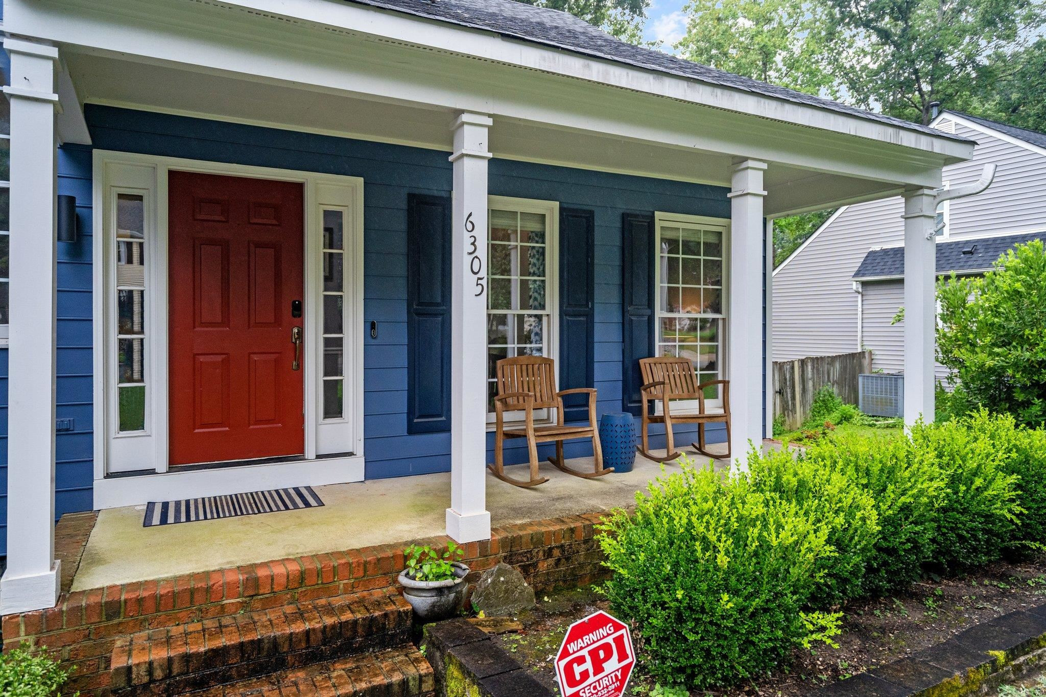 6305 Dry Fork Lane Raleigh, NC 27617 - Photo 31 of 41 front view of a house with a fountain