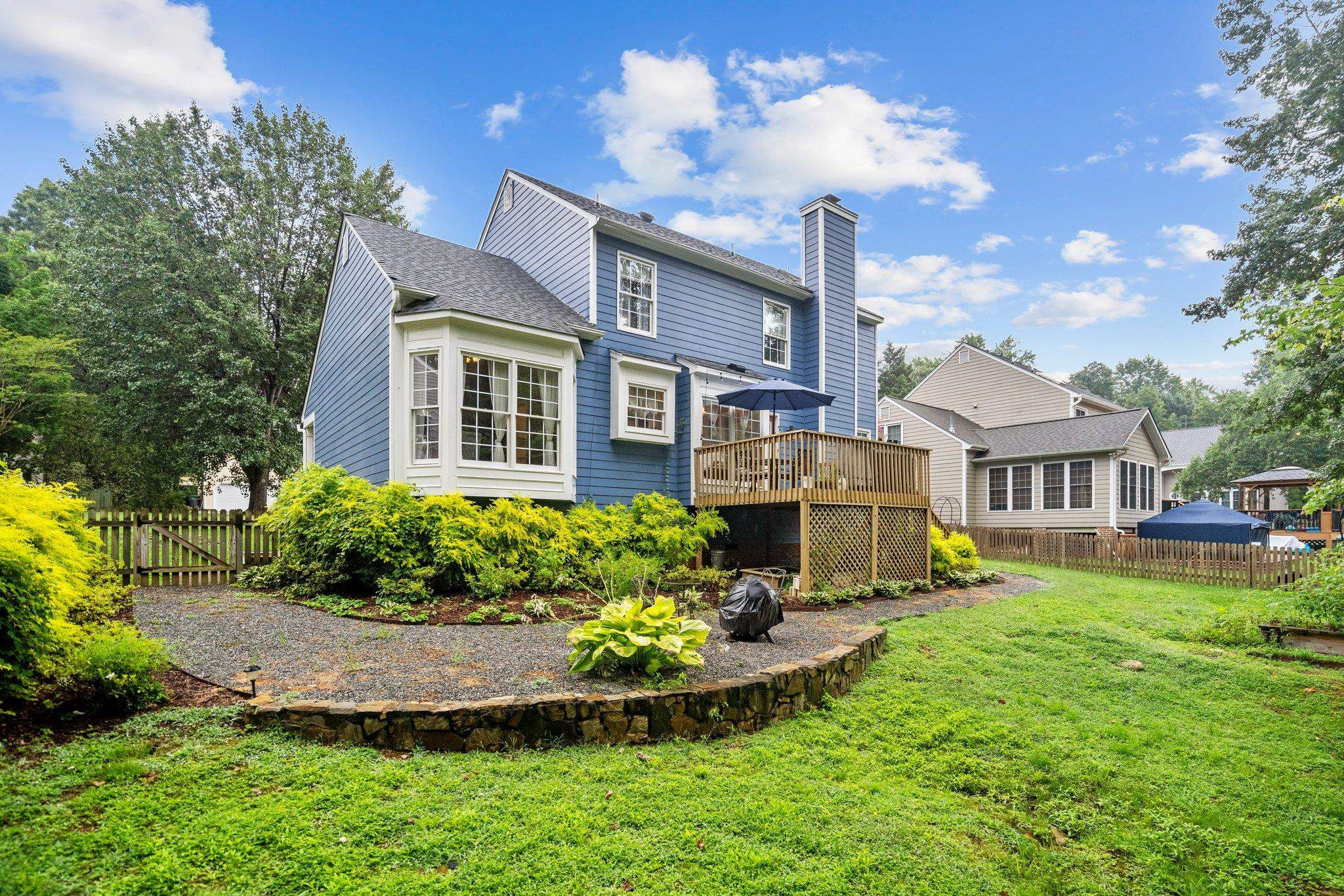 6305 Dry Fork Lane Raleigh, NC 27617 - Photo 32 of 41 a front view of a house with a yard