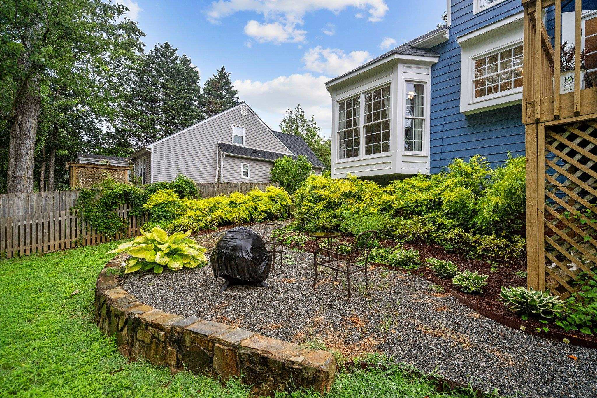 6305 Dry Fork Lane Raleigh, NC 27617 - Photo 35 of 41 a wooden bench sitting in front of a house