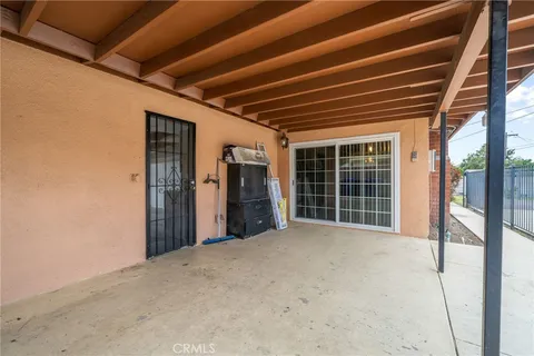 a view of a big room with closet and large windows