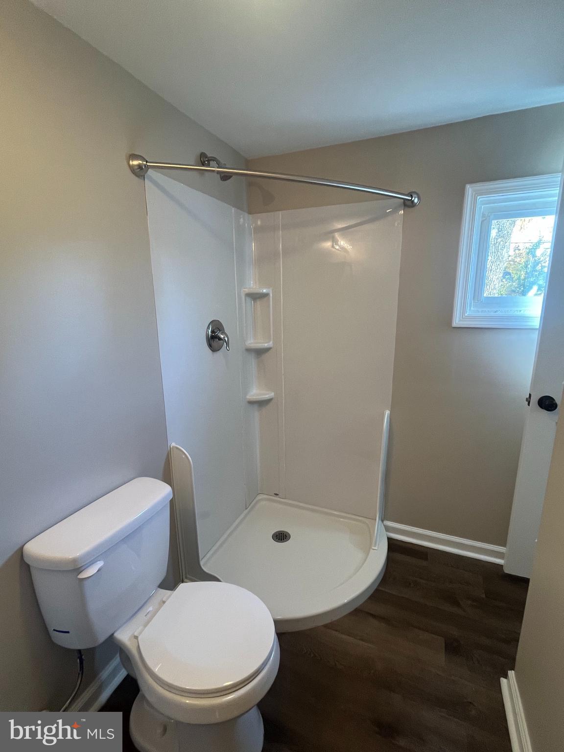 1881 Williamstown Road Sicklerville, NJ 08081 - Photo 12 of 13 a white toilet sitting next to a shower