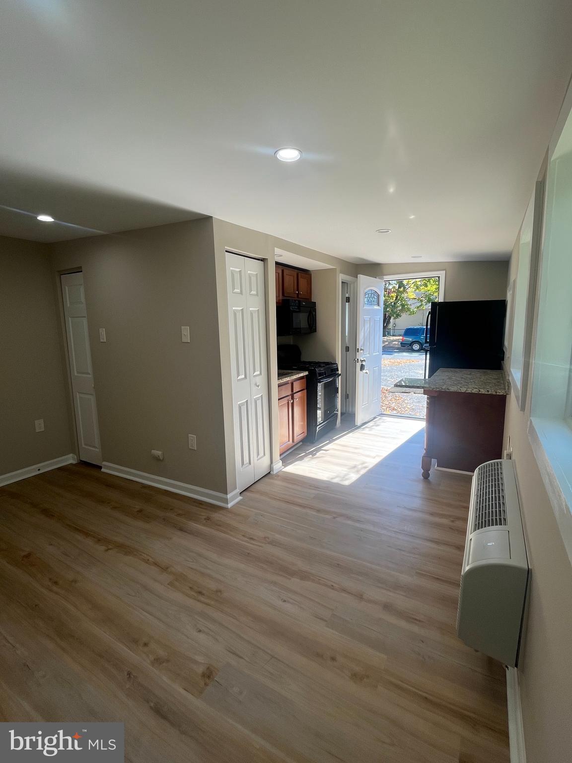 1881 Williamstown Road Sicklerville, NJ 08081 - Photo 5 of 13 an empty room with wooden floor and furniture
