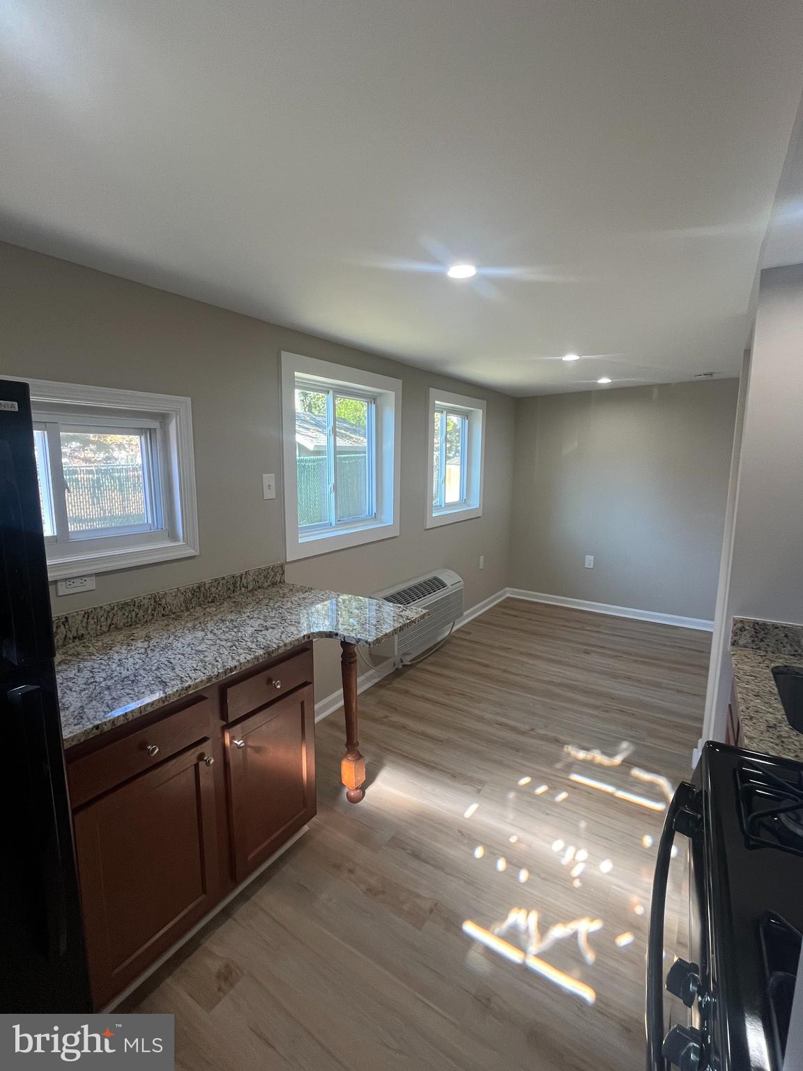 1881 Williamstown Road Sicklerville, NJ 08081 - Photo 9 of 13 a view of kitchen and hall with wooden floor