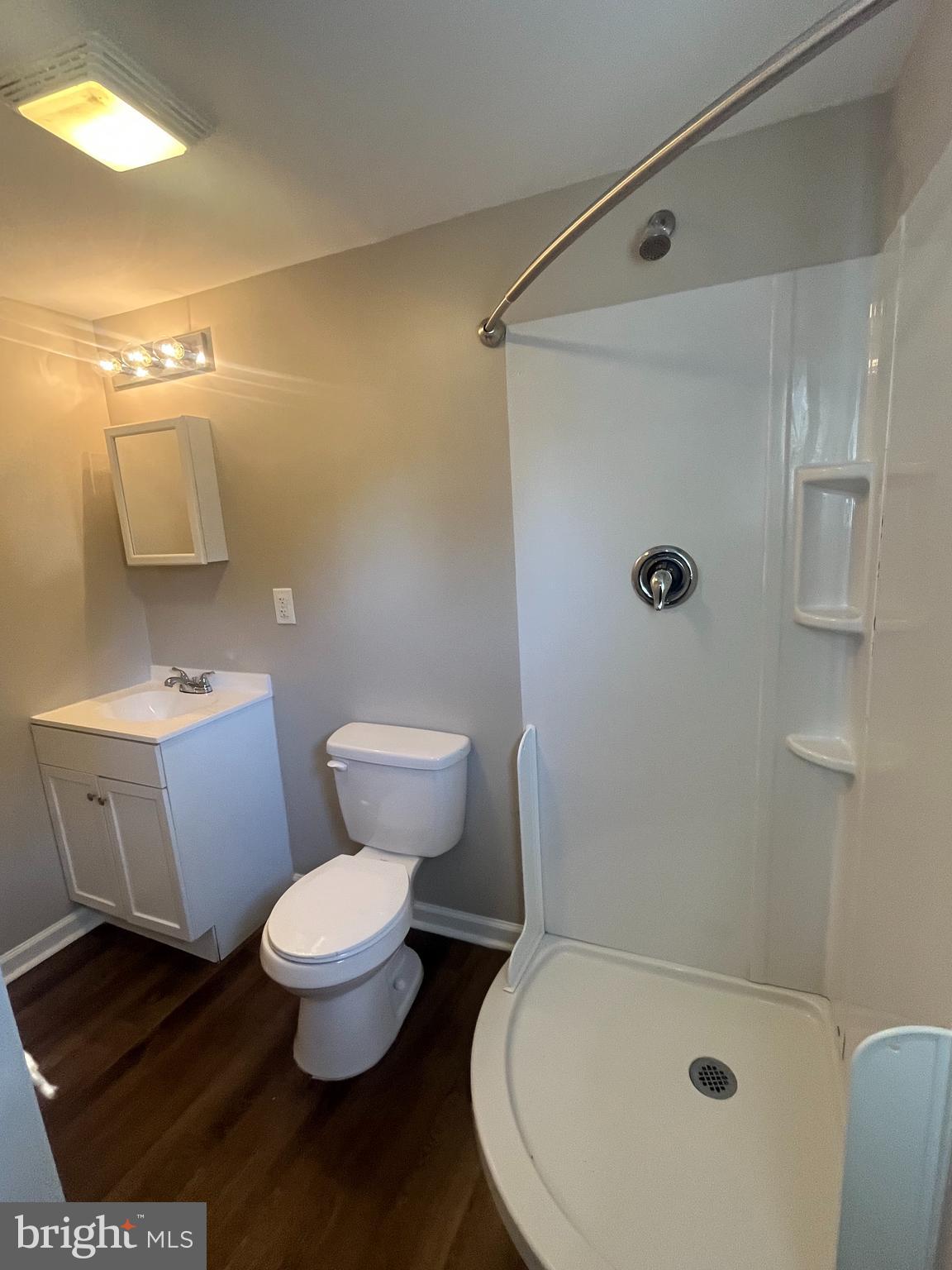 1881 Williamstown Road Sicklerville, NJ 08081 - Photo 10 of 13 a white toilet sitting next to a bath tub shower