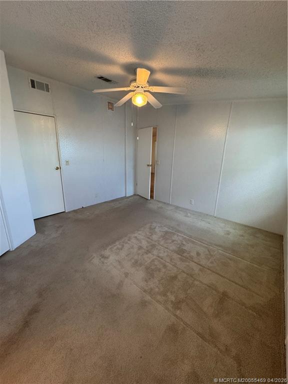 4236 Southeast Sweetwood Way Stuart, FL 34997 - Photo 21 of 50 a view of an empty room with a window