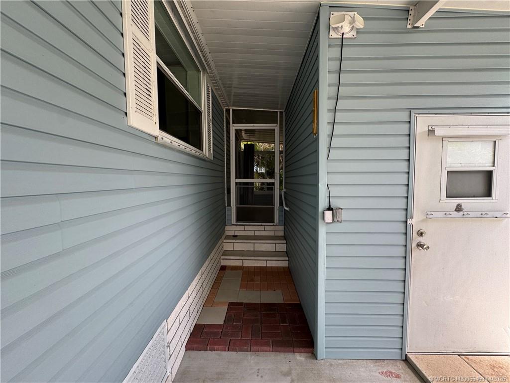 4236 Southeast Sweetwood Way Stuart, FL 34997 - Photo 35 of 50 a view of a entryway