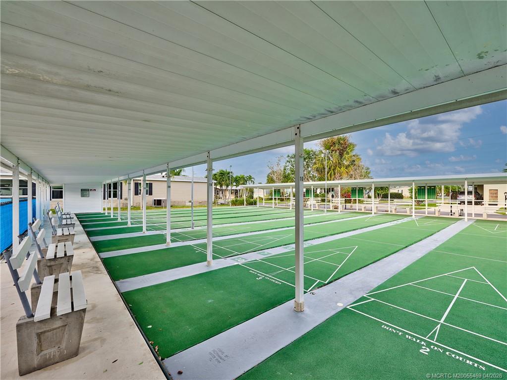 4236 Southeast Sweetwood Way Stuart, FL 34997 - Photo 49 of 50 a view of house with a big yard