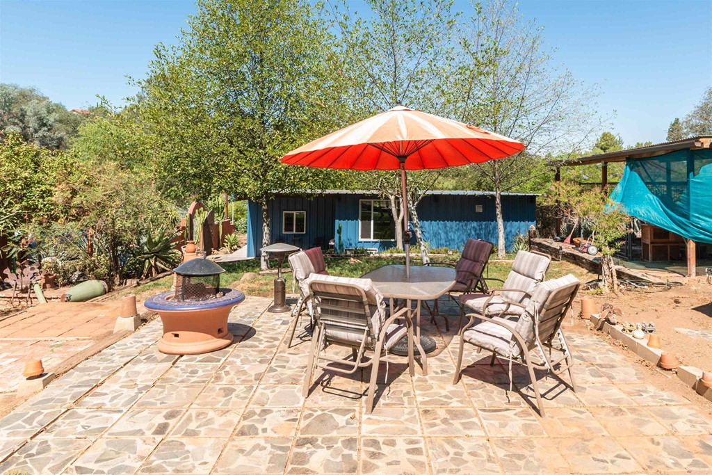 1168 Alpine Heights Road Alpine, CA 91901 - Photo 39 of 72 an outdoor space with furniture and umbrella