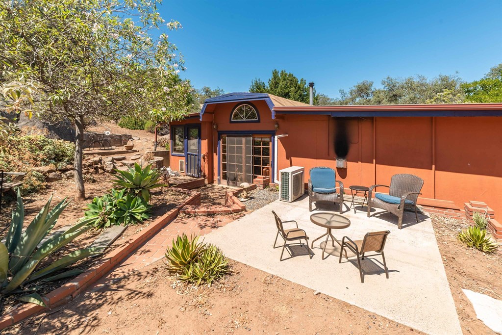 1168 Alpine Heights Road Alpine, CA 91901 - Photo 51 of 72 a view of a dinning table and chairs in patio