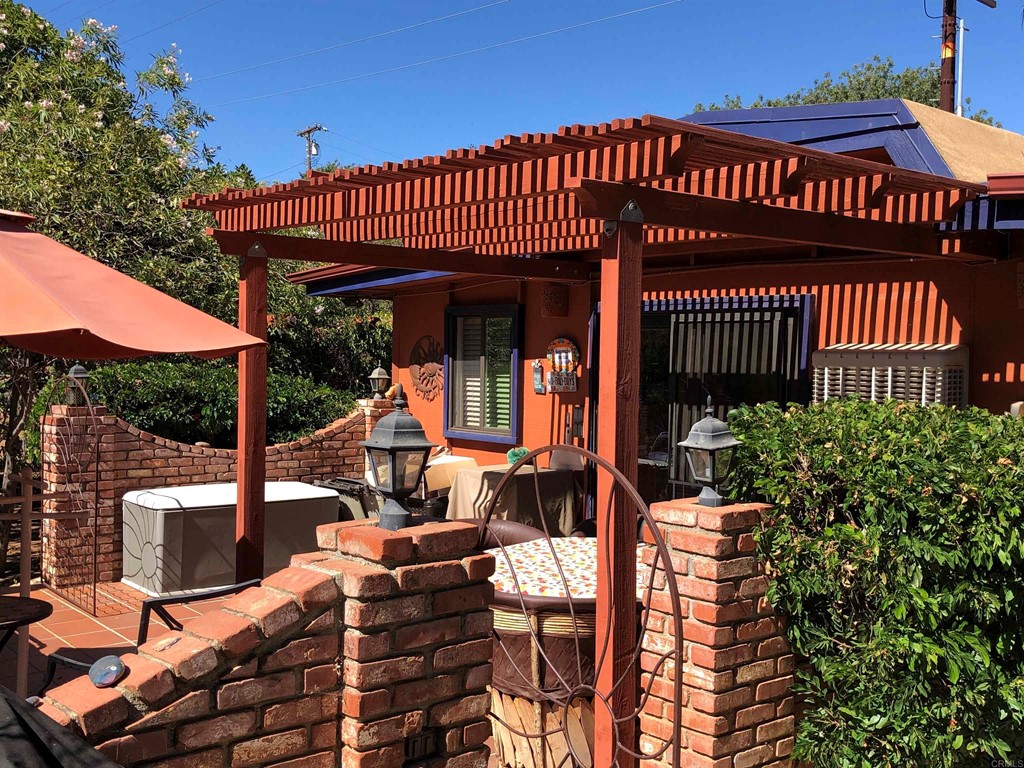 1168 Alpine Heights Road Alpine, CA 91901 - Photo 56 of 72 a view of a house with a patio