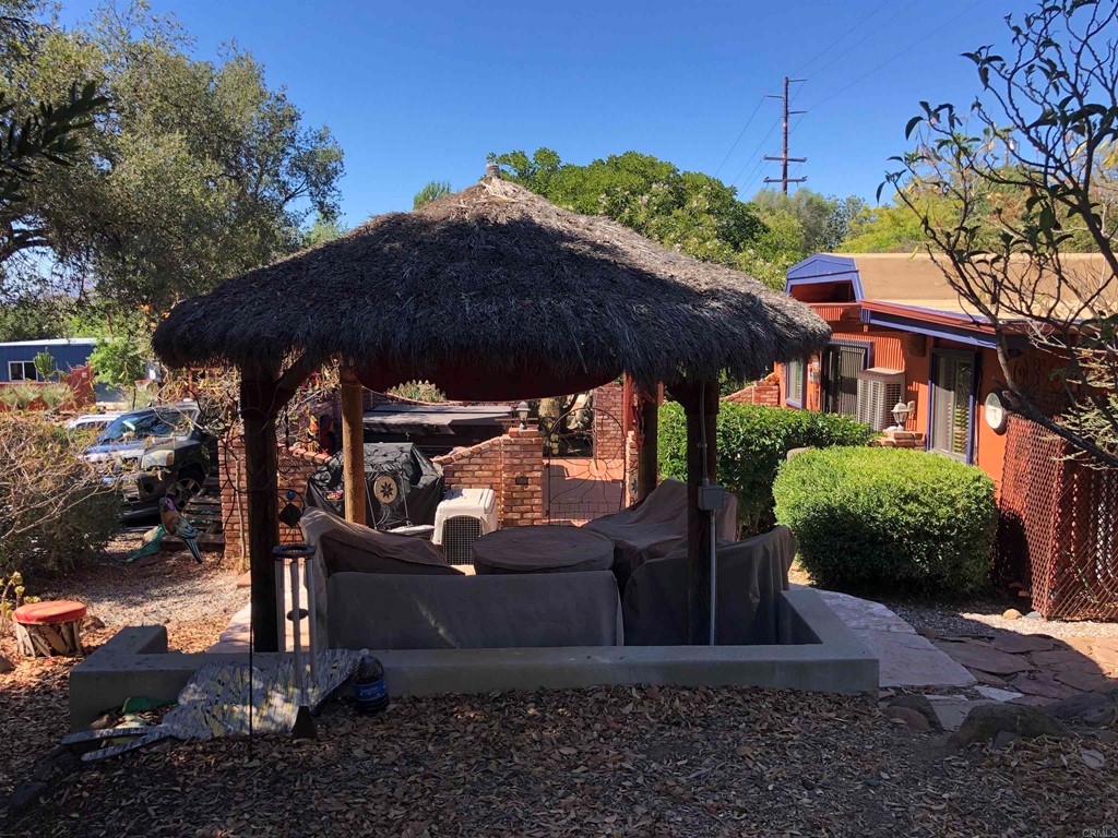 1168 Alpine Heights Road Alpine, CA 91901 - Photo 61 of 72 a view of a backyard with plants and a patio