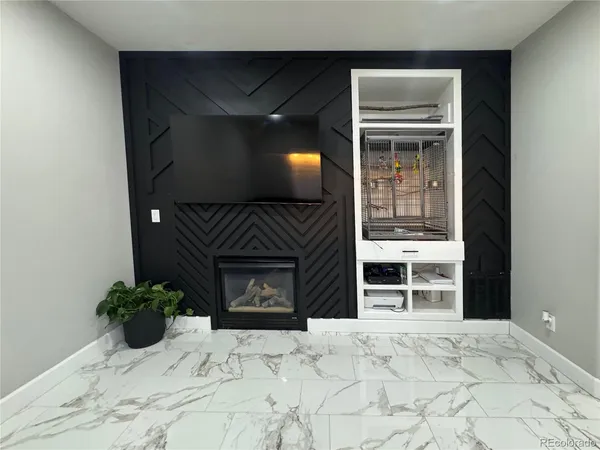 a view of fireplace and window