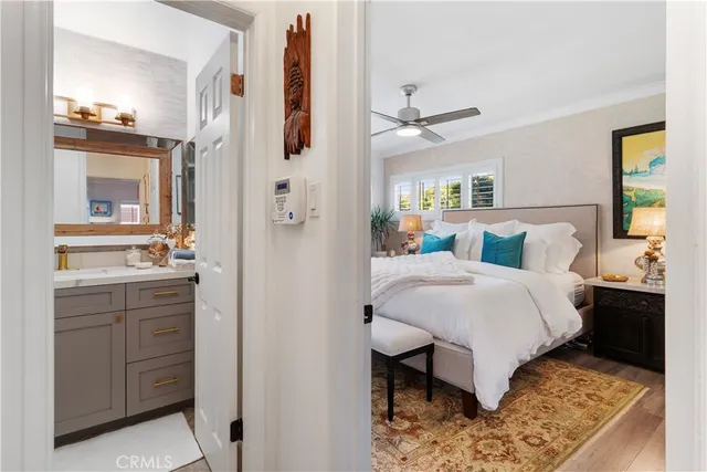 a bedroom with a bed and a table