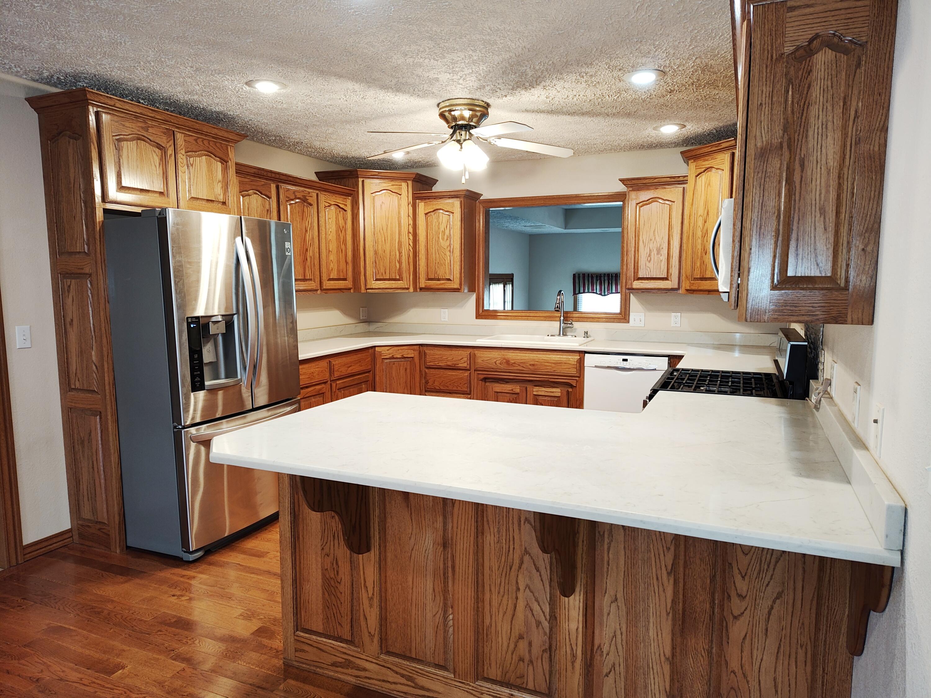 4107 South 118th Road Bolivar, MO 65613 - Photo 14 of 48 Kitchen with hardwood floors
