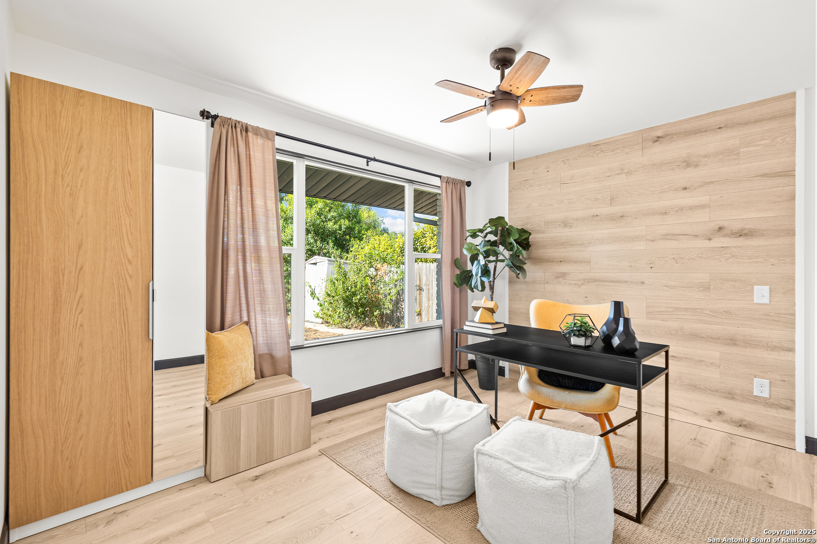 446 Spaceway Drive Windcrest, TX 78239 - Photo 21 of 28 a work room with furniture and a window