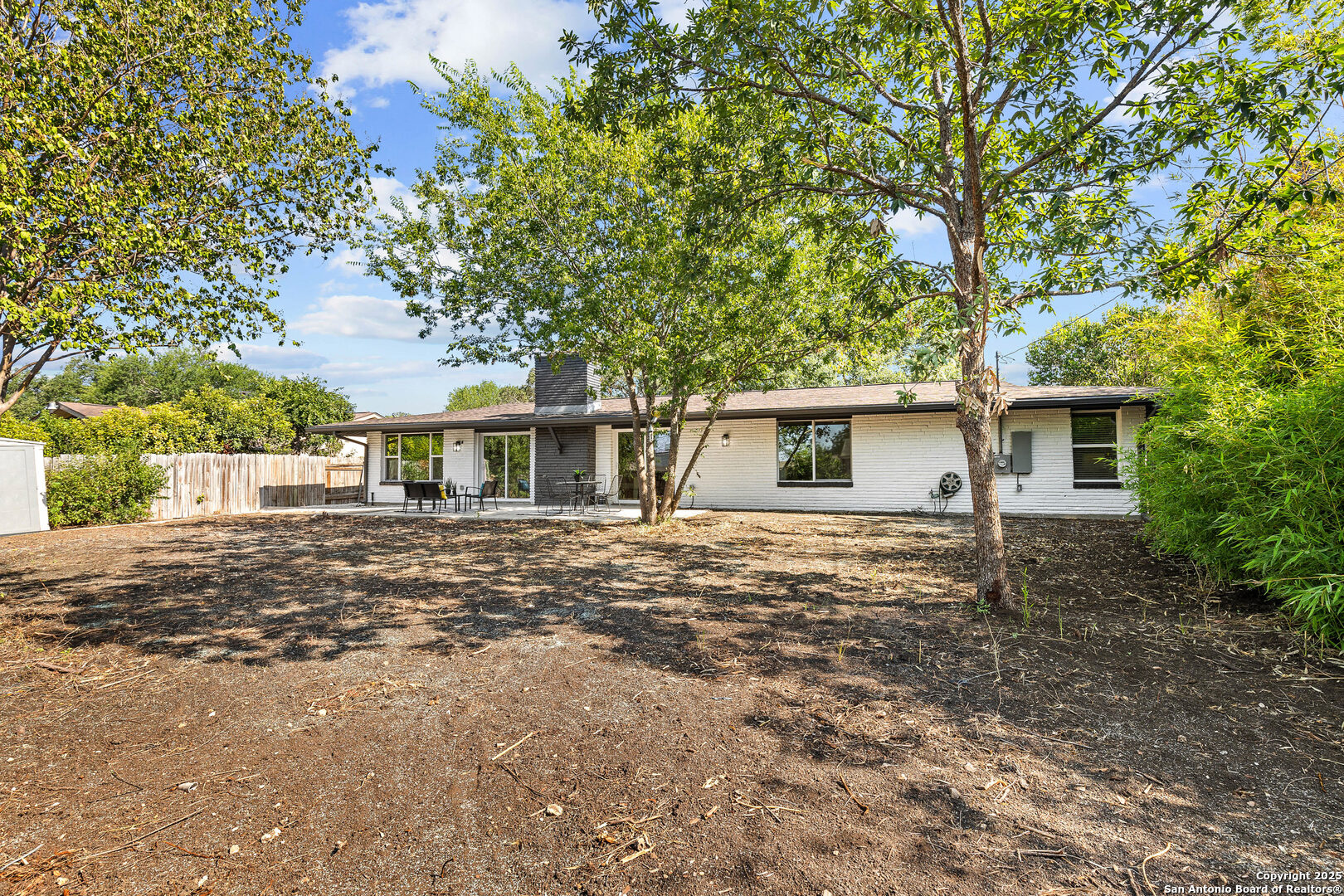 446 Spaceway Drive Windcrest, TX 78239 - Photo 28 of 28 a front view of a house with a garden