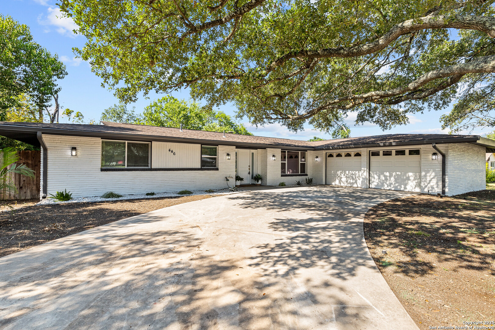 446 Spaceway Drive Windcrest, TX 78239 - Photo 3 of 28 a front view of a house with a yard