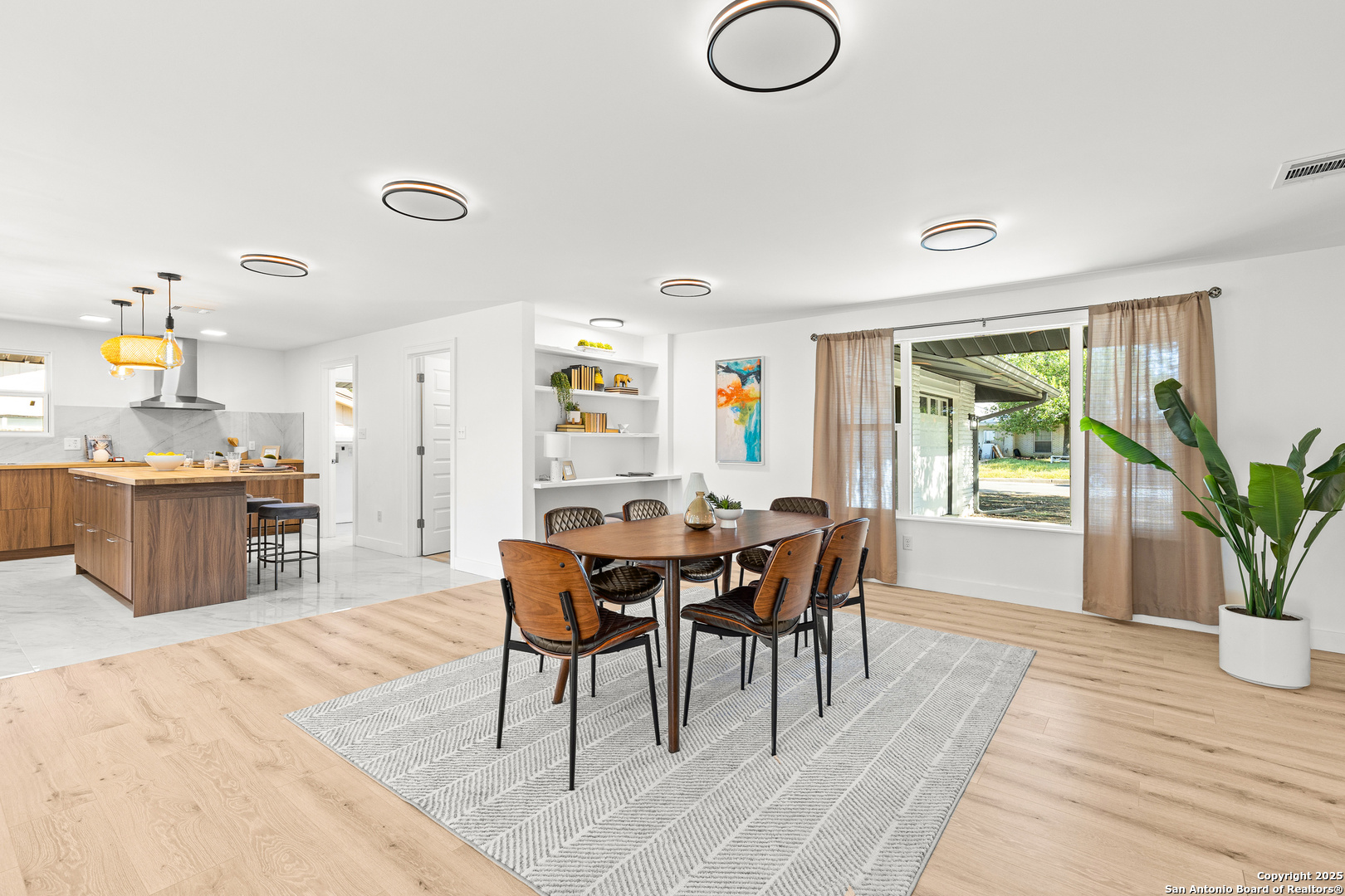 446 Spaceway Drive Windcrest, TX 78239 - Photo 9 of 28 a dining room with furniture and window