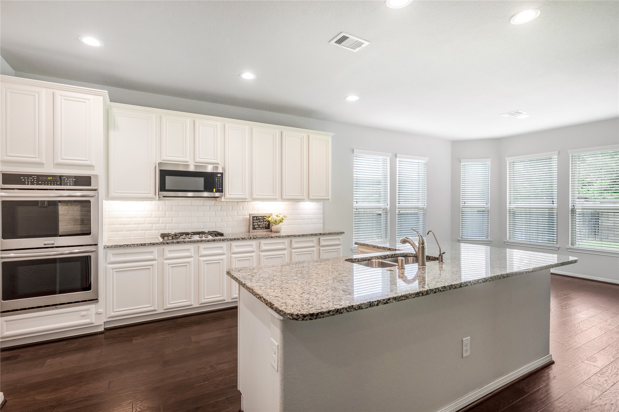 23018 Southern Brk Trail Spring, TX 77389 - Photo 17 of 43 Large kitchen with double ovens, gas cooktop and built in micowave.