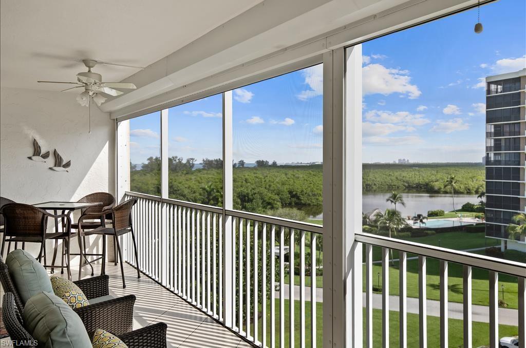 Undisclosed Address Naples, FL 34108 - Photo 2 of 14 a view of a balcony with furniture