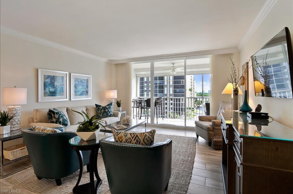 Undisclosed Address Naples, FL 34108 - Photo 6 of 14 a living room with furniture and a large window