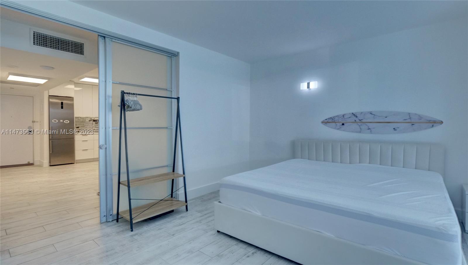 2301 Collins Avenue, Unit 321 Miami Beach, FL 33139 - Photo 14 of 33 a room with a bed and a shower