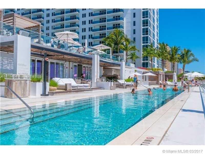 2301 Collins Avenue, Unit 321 Miami Beach, FL 33139 - Photo 9 of 33 a view of a swimming pool with a patio