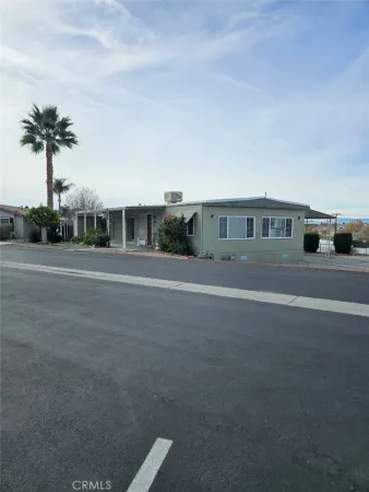 a view of a street with a house