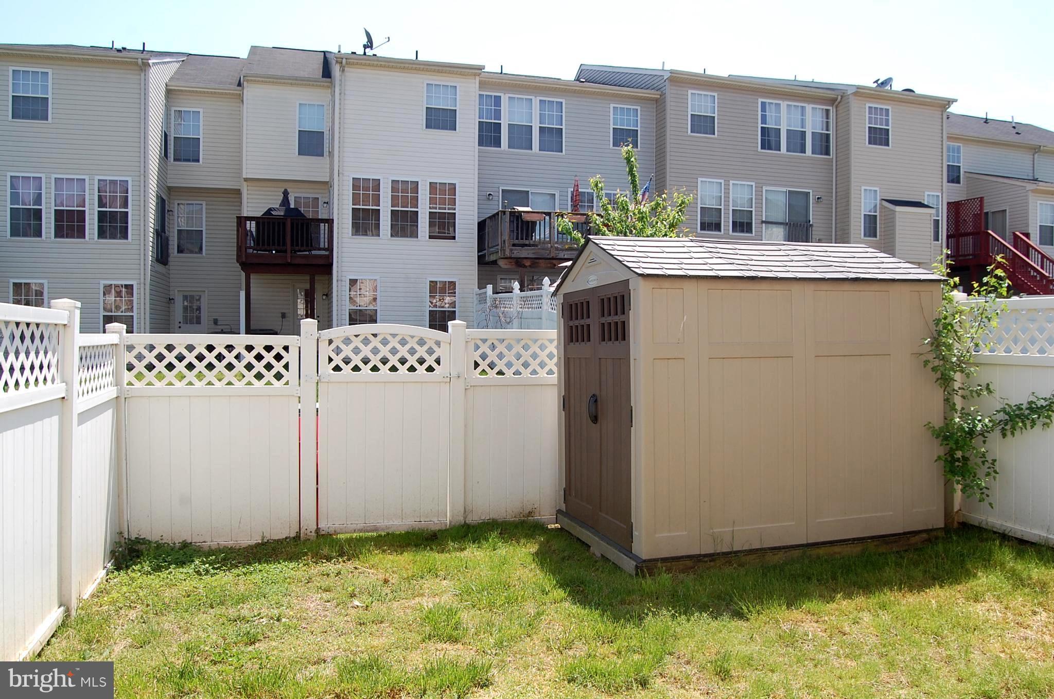 1236 Steed Street Ranson, WV 25438 - Photo 20 of 24 Fenced in yard with utility shed