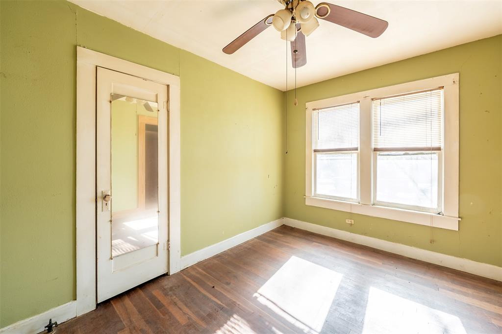 3710 County Road 334 Tyler, TX 75708 - Photo 13 of 29 a view of an empty room with wooden floor and a window