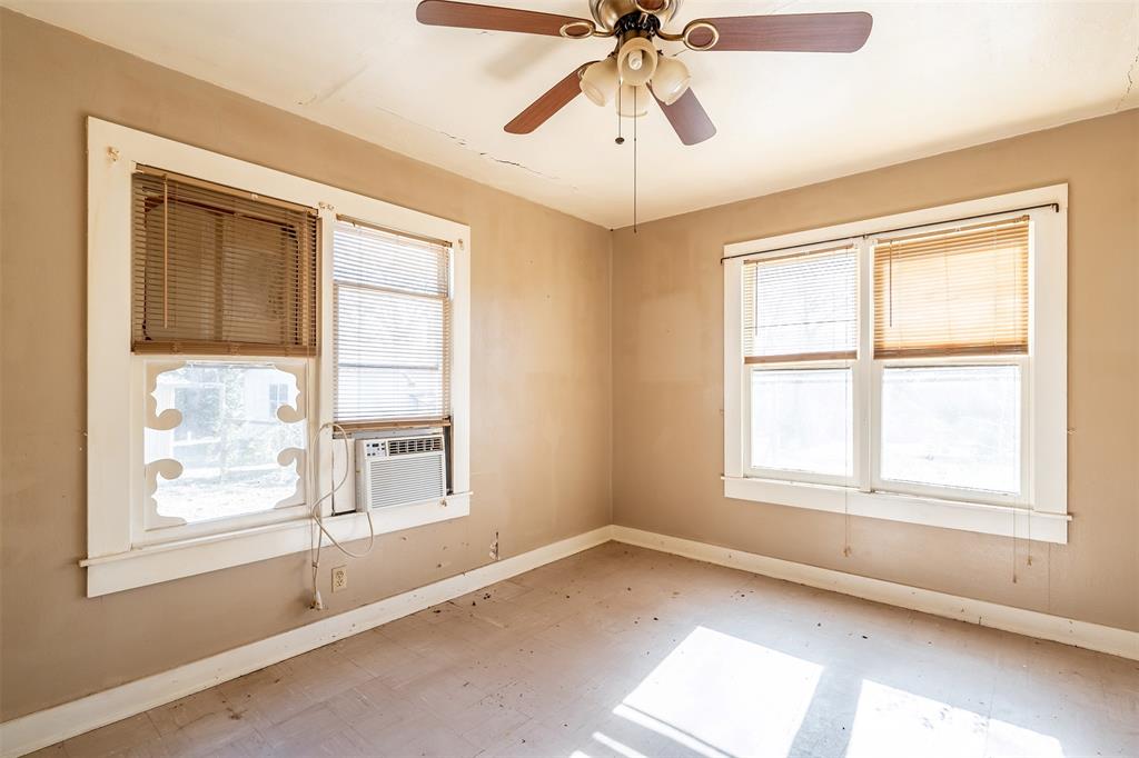 3710 County Road 334 Tyler, TX 75708 - Photo 15 of 29 a view of an empty room with a window and wooden floor