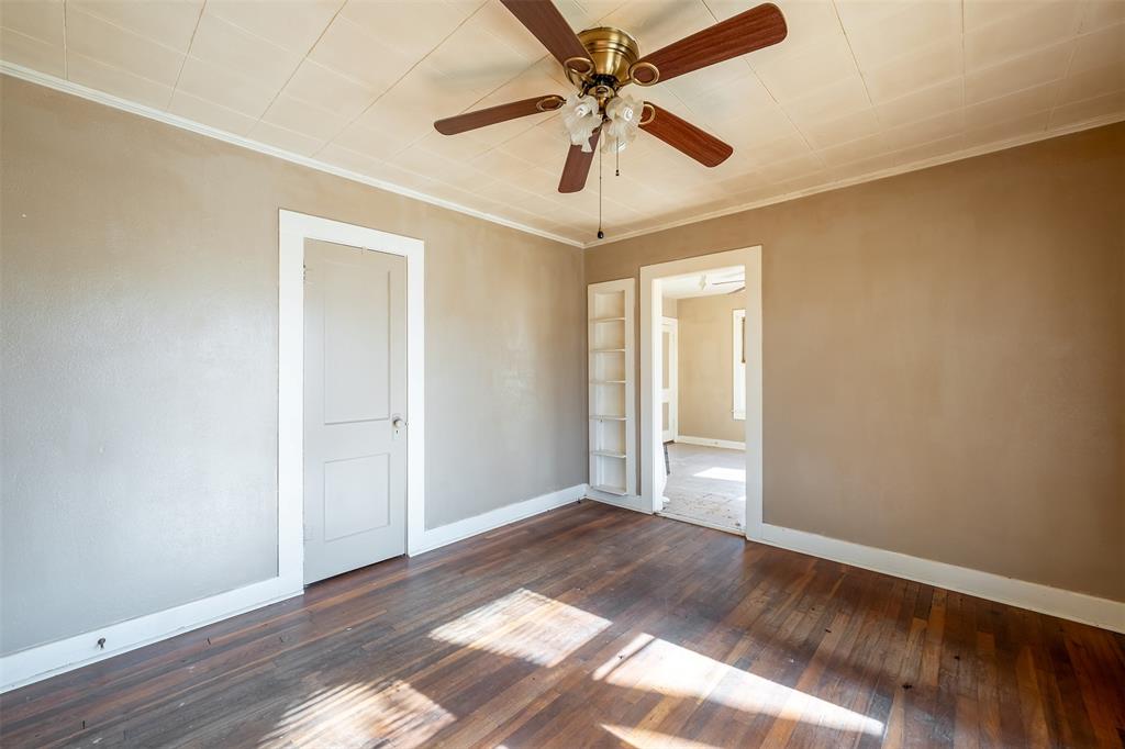 3710 County Road 334 Tyler, TX 75708 - Photo 18 of 29 a view of an empty room and window with wooden floor