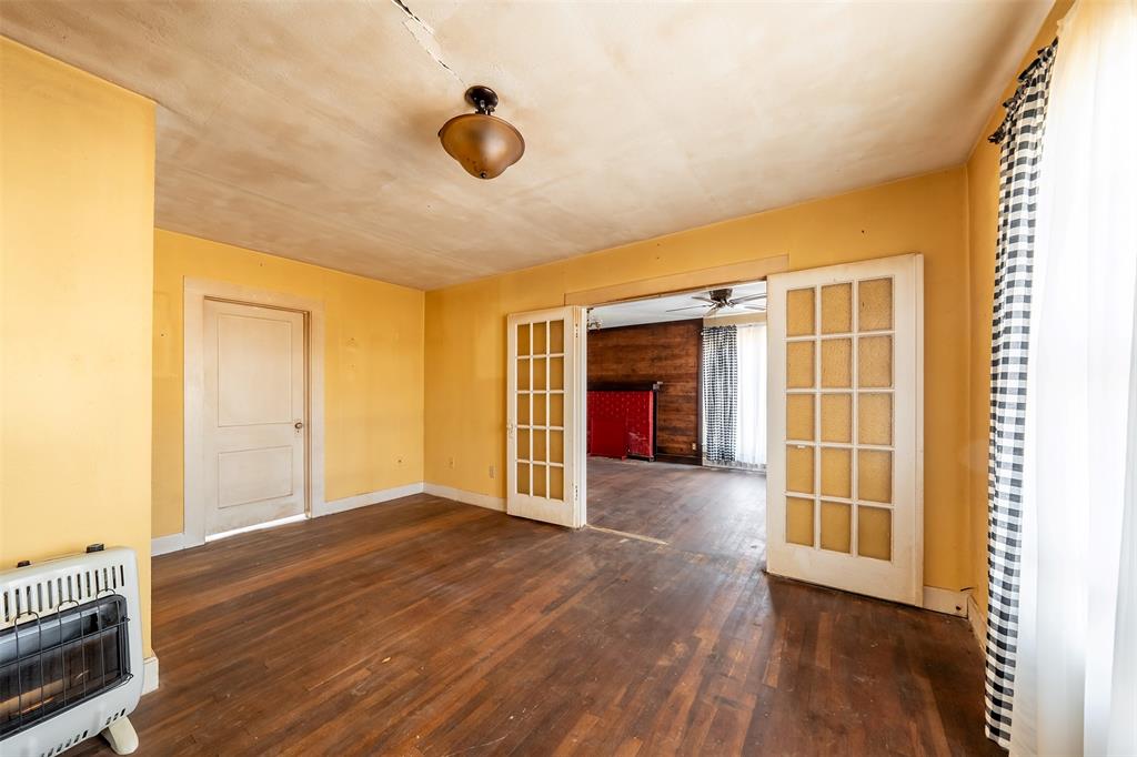 3710 County Road 334 Tyler, TX 75708 - Photo 7 of 29 an empty room with wooden floor and natural light