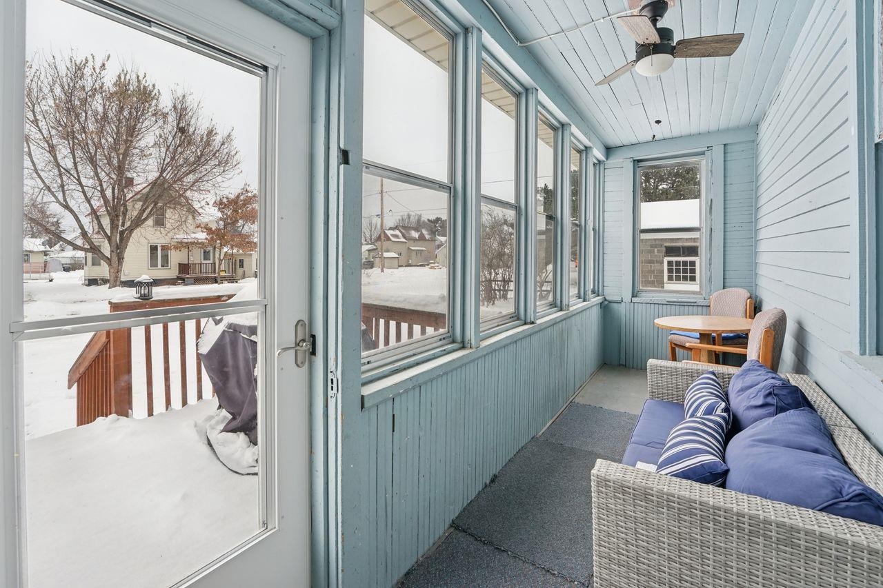 802 3rd Avenue East Ashland, WI 54806 - Photo 17 of 22 Sunroom / solarium with a ceiling fan and a balcony