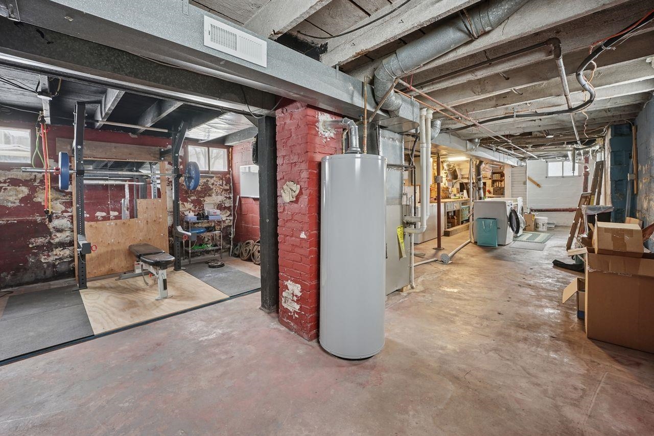 802 3rd Avenue East Ashland, WI 54806 - Photo 18 of 22 Basement featuring water heater