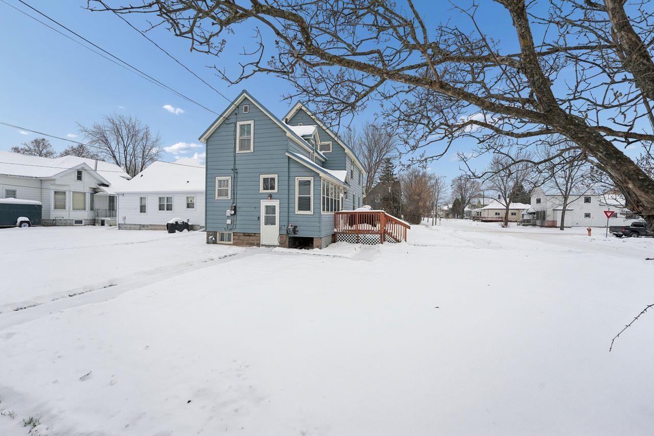 802 3rd Avenue East Ashland, WI 54806 - Photo 22 of 22 View of snowy exterior featuring a deck