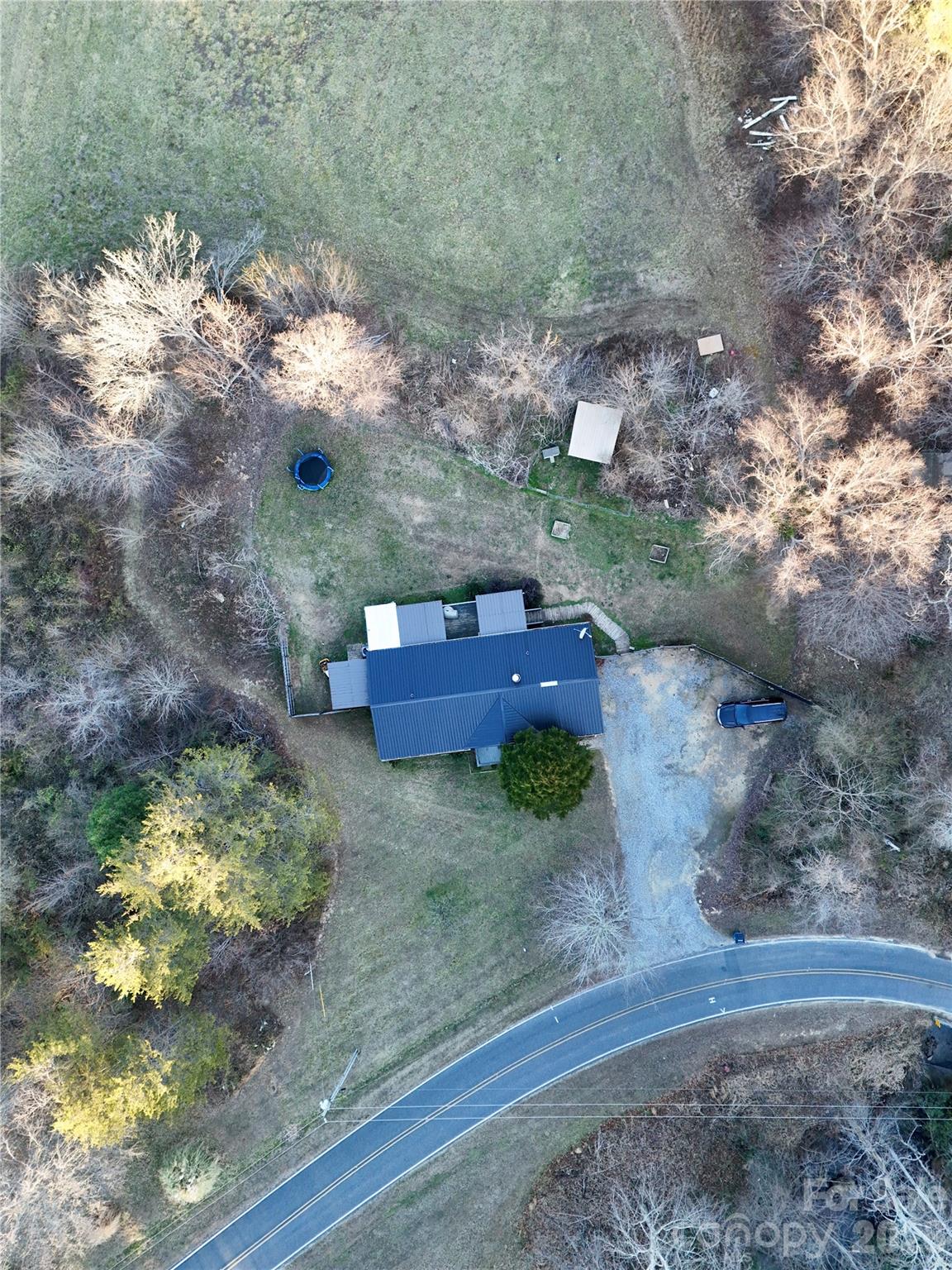 5425 Old Creek Road Morganton, NC 28655 - Photo 21 of 22 a view of a yard with a tree