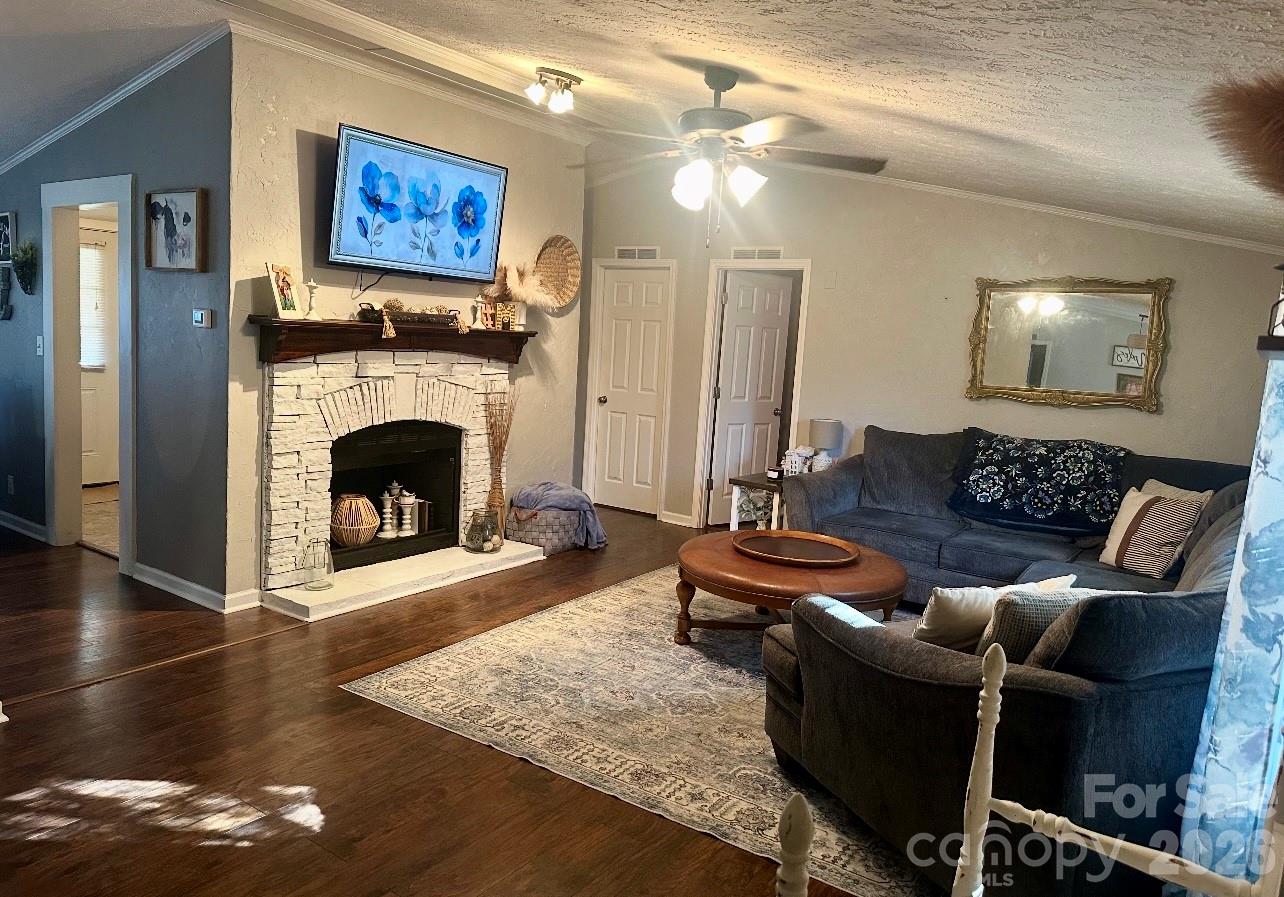5425 Old Creek Road Morganton, NC 28655 - Photo 5 of 22 a living room with furniture and a fireplace