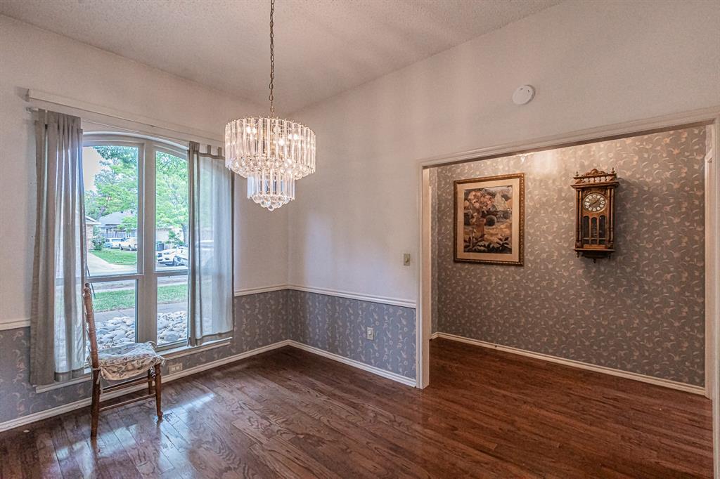 3309 Timber View Circle Bedford, TX 76021 - Photo 4 of 38 a view of livingroom with hardwood floor and window