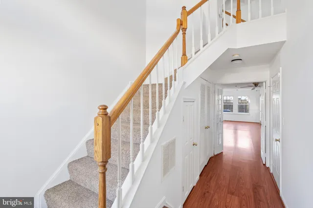 a view of staircase with wooden floor and staircase