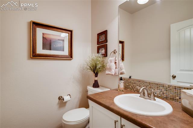 7676 Wichita Ridge Point Colorado Springs, CO 80923 - Photo 13 of 34 Main level hall bath