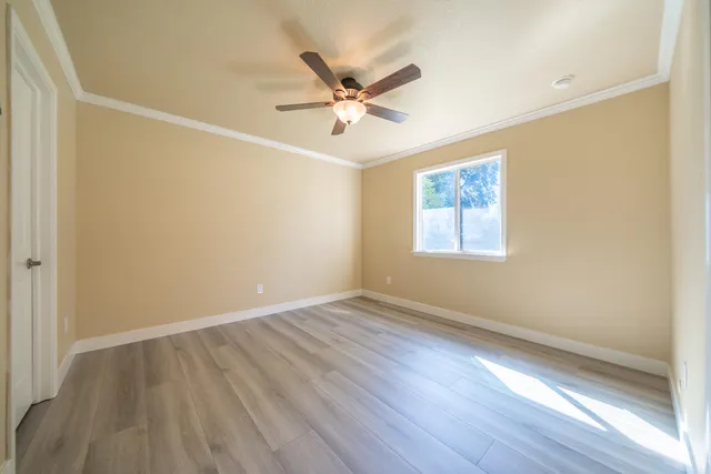 a view of wooden balcony with wooden floor and fence