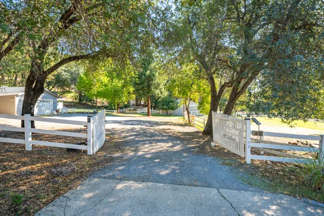 a view of outdoor space with deck and a garden