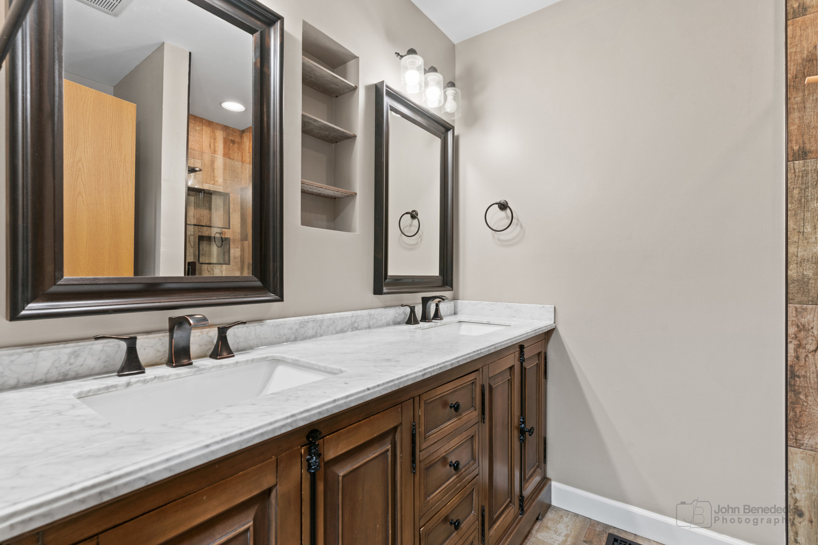 115 Ione Drive, Unit E South Elgin, IL 60177 - Photo 14 of 29 a bathroom with a granite countertop sink and a mirror