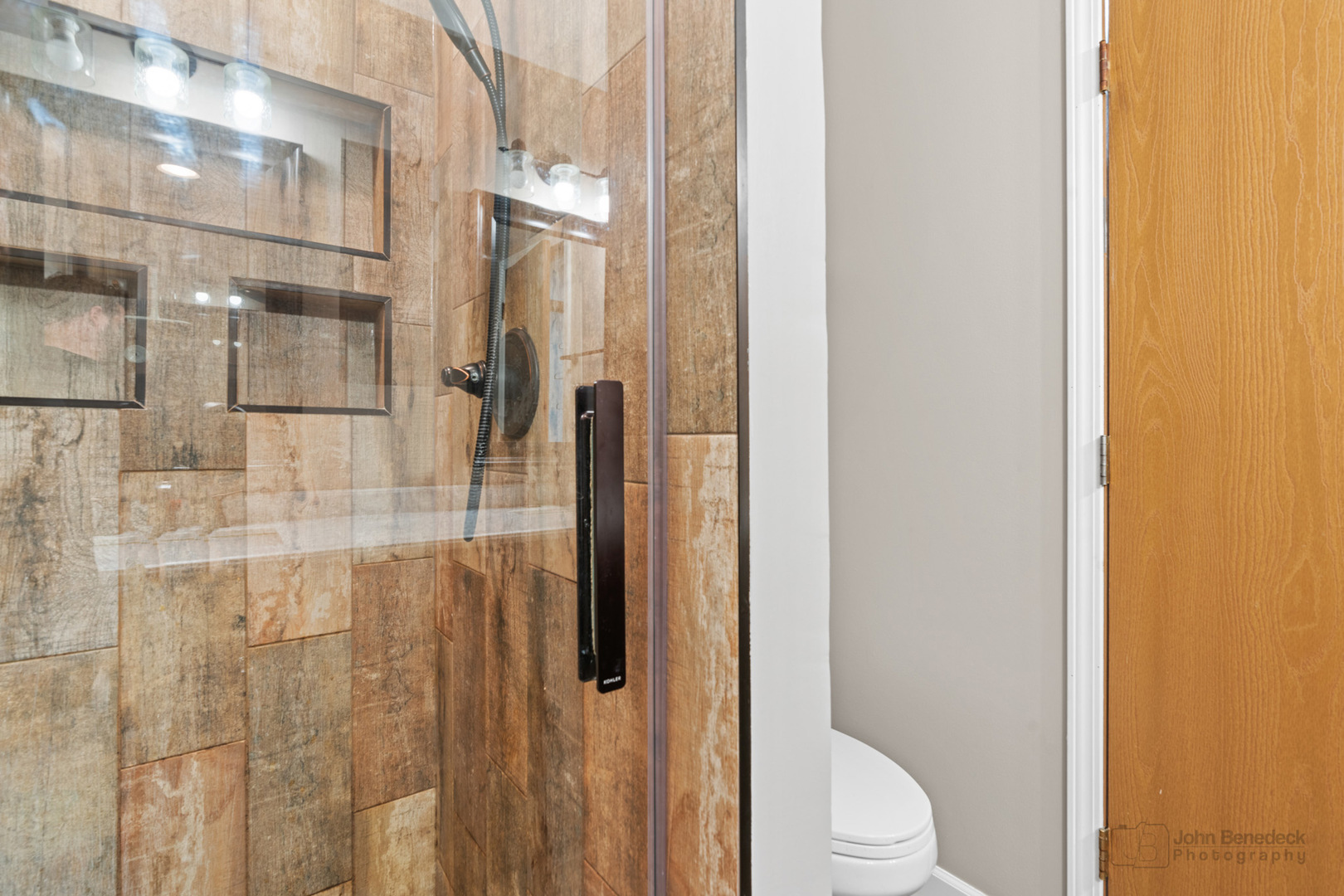 115 Ione Drive, Unit E South Elgin, IL 60177 - Photo 15 of 29 a bathroom with a toilet and shower